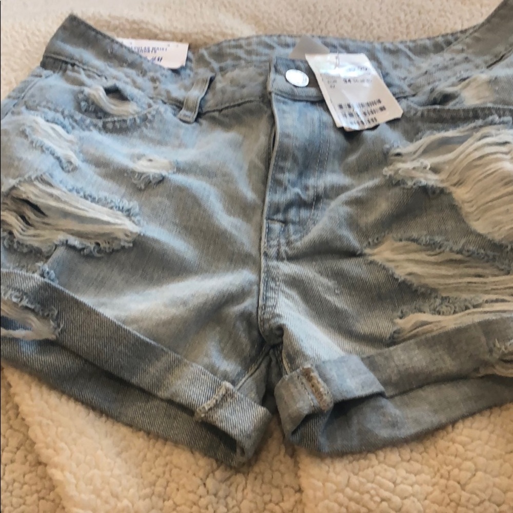 NWT H&M denim distressed light wash shorts